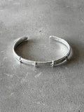 M.A+ Thin Silver Stitched Cross silver Bangle