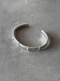M.A+ Thin Silver Stitched Cross silver Bangle