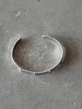 M.A+ Thin Silver Stitched Cross silver Bangle
