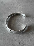 M.A+ Thin Silver Stitched Cross silver Bangle
