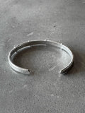 M.A+ Thin Silver Stitched Cross silver Bangle