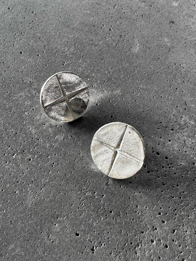 M.A+ Round Plate Carved Cross Earring