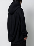 Anrealage Reverse Weave Hoodie Sweatshirt in Black
